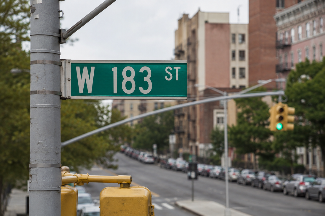 The W 183rd Street sign in Washington Heights — the street number TAKI 183 wrote across New York.