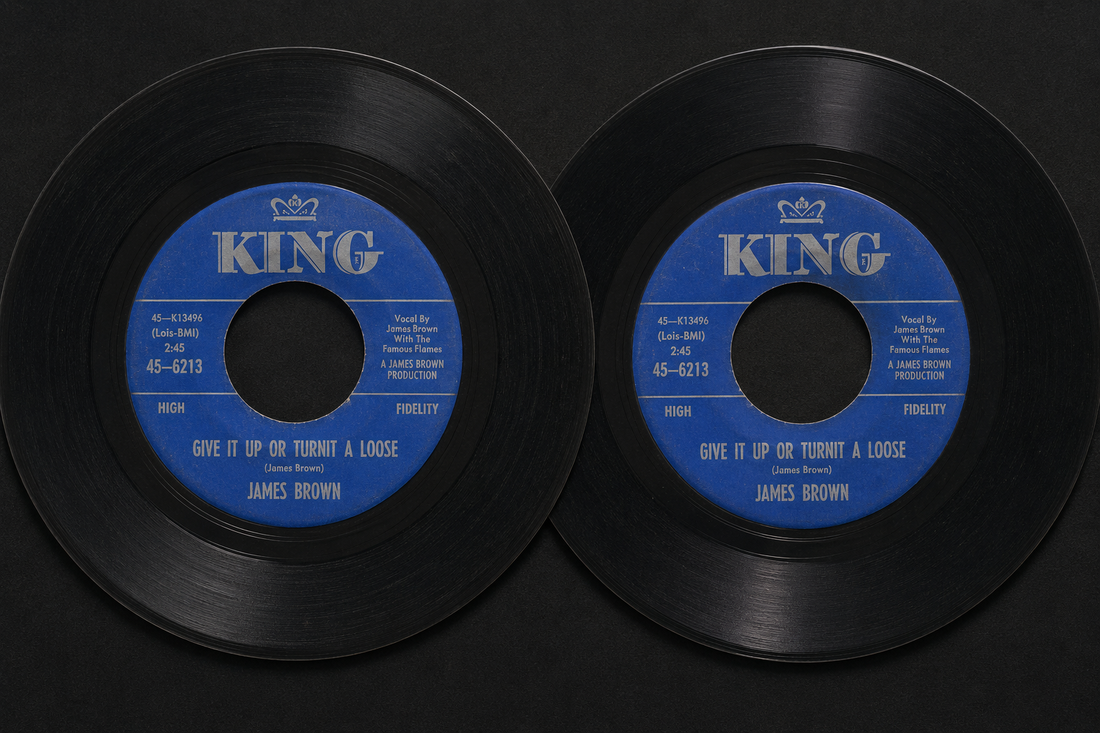 Two identical copies of the same record, side by side — the purchase that made the merry-go-round possible