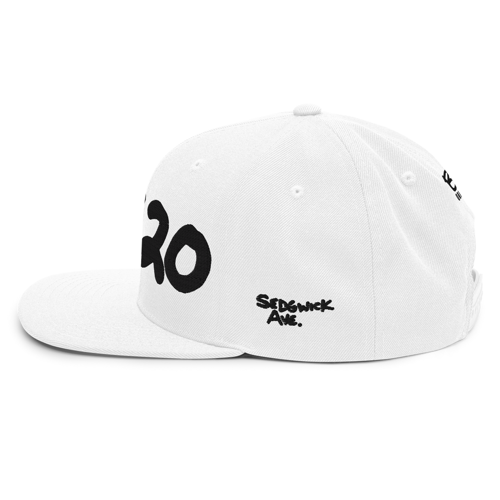 Left side view of the white 1520 Cap with Sedgwick Ave script